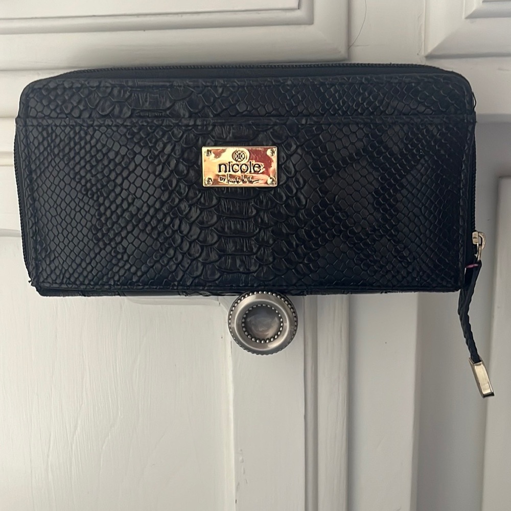 Nicole Miller black zipper wallet.